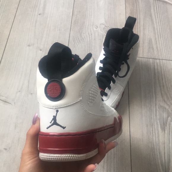 Jordan 9’s in a red, white, and black color way
